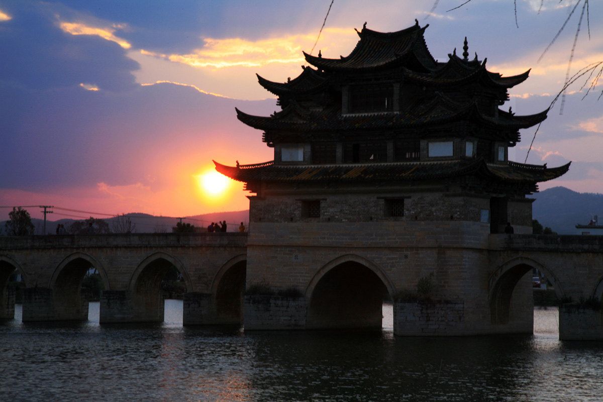 Traditional architecture at sunset in Yunnan